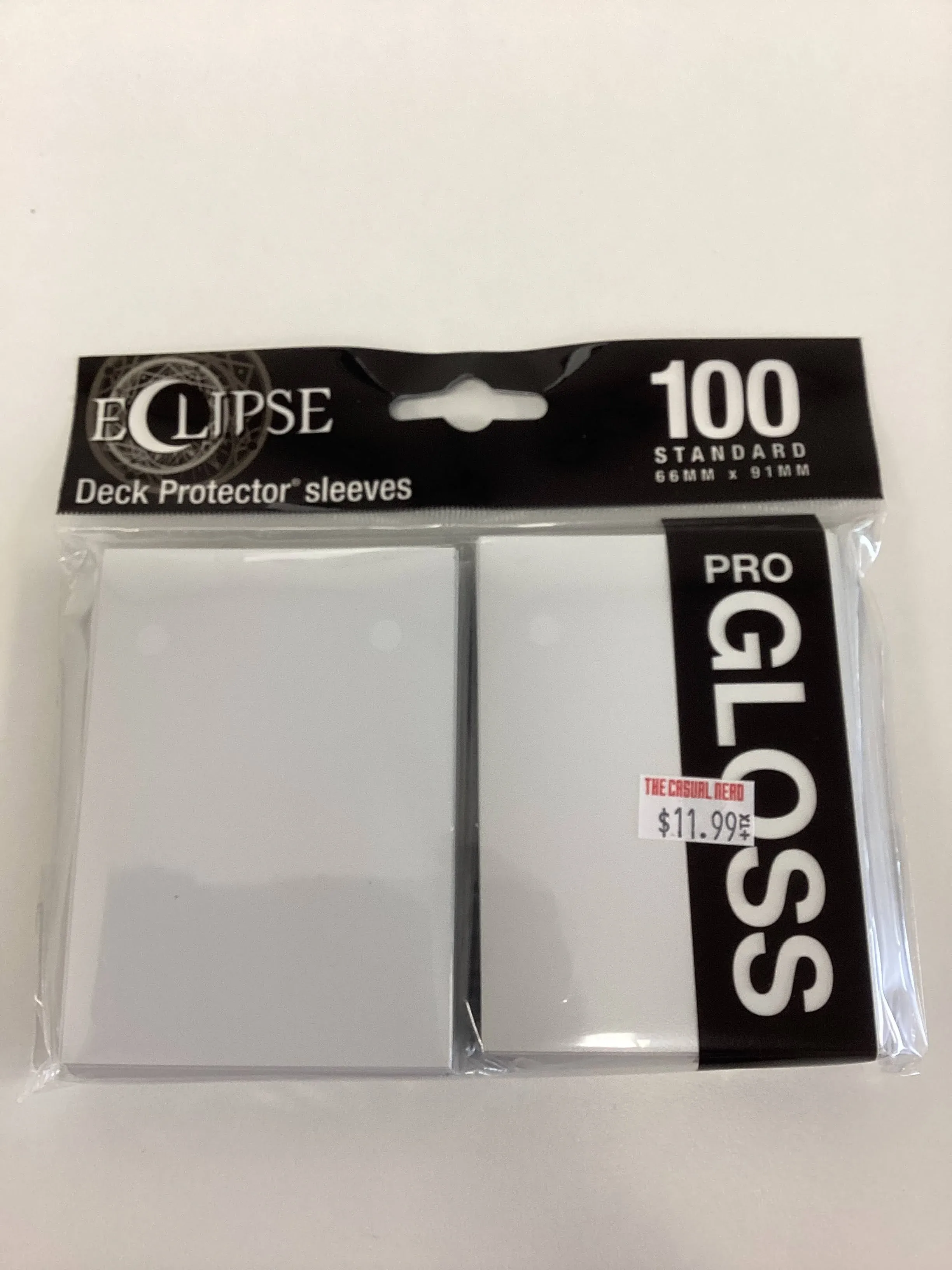 UPR15600 Arctic White Gloss Standard Sleeves 66mm x 91mm 100-sleeves S