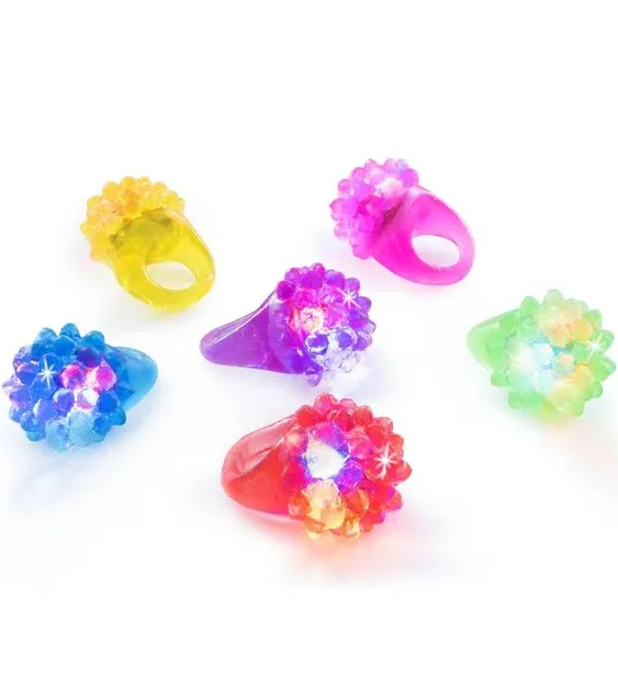 Super Z Outlet Flashing Colorful LED Light Up Bumpy Jelly Rubber Rings Finger Toys for Parties Event Favors Raves Concert Shows