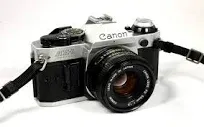 Canon AE-1 35mm SLR Film Camera with Canon 50mm f/1.8 FD Lens,  nice